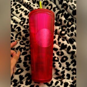 Used Starbucks cup bright pink